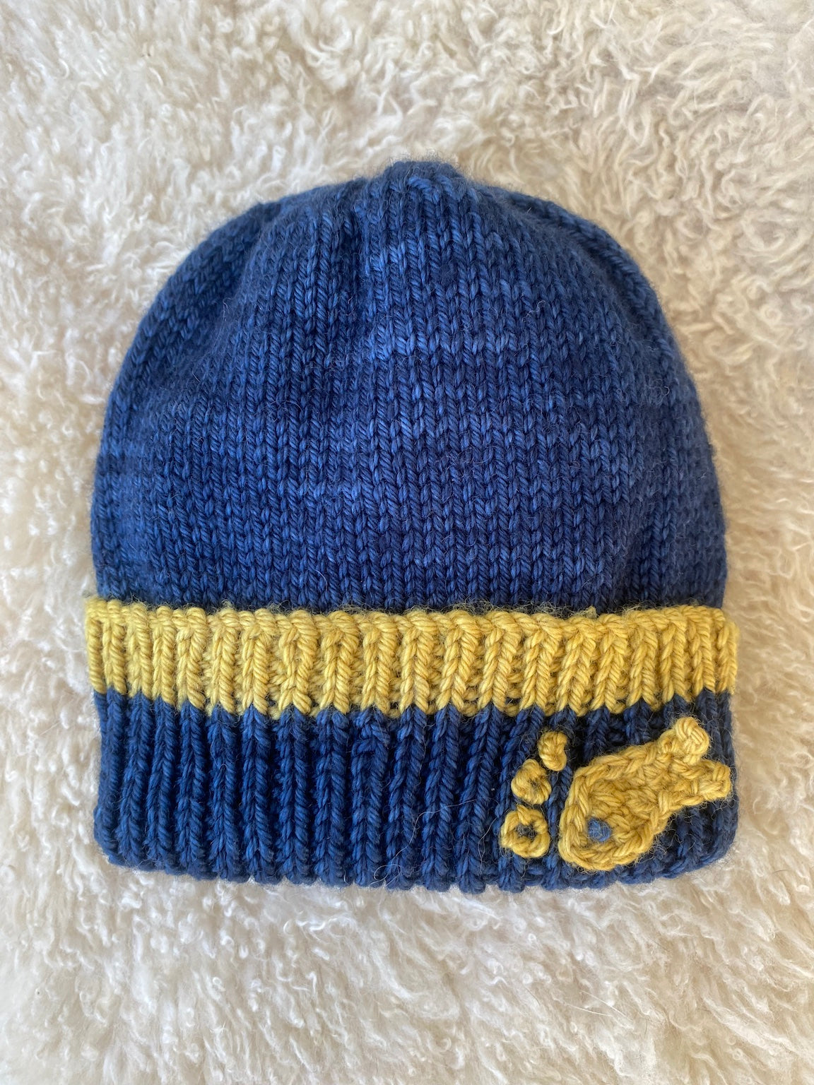 blue merino wool baby beanie with crochet fish