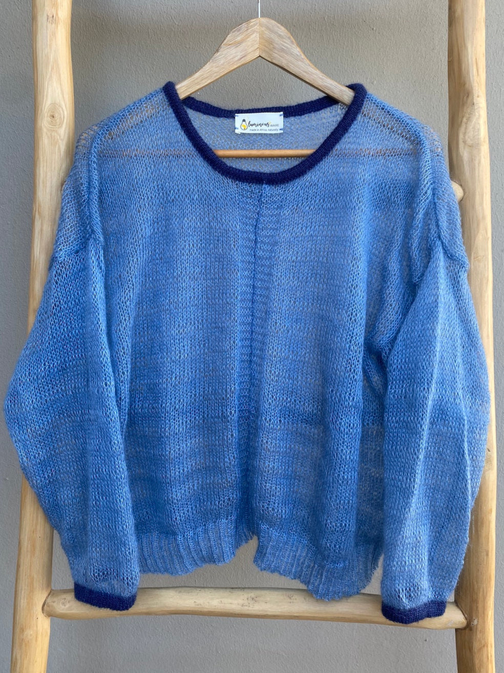 Dirty light blue mohair knit with navy trims