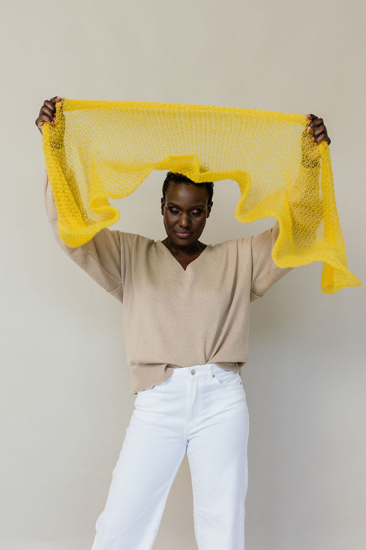 Woman with yellow mohair scarf