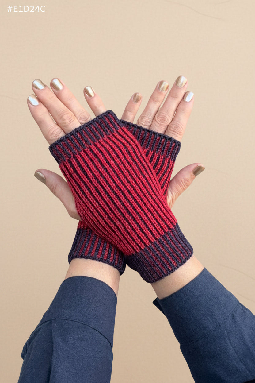 Hands with navy and red gloves