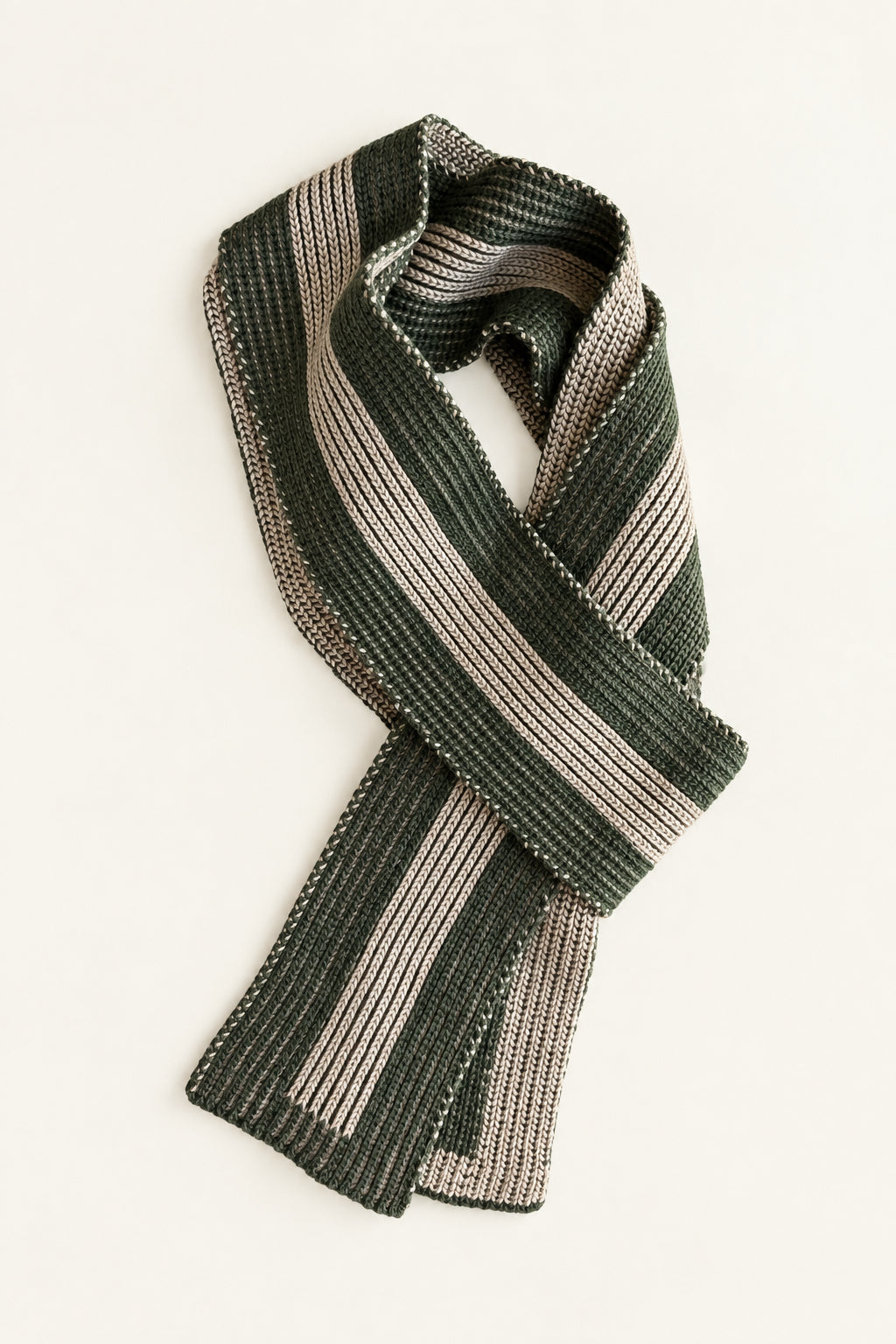 striped skinny scarf in sand and moss green wool folded against light background