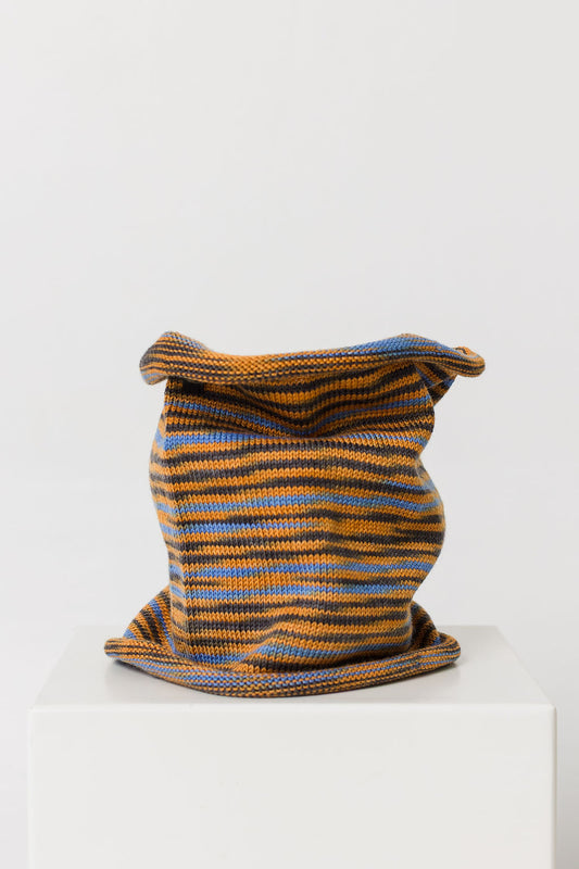 wool neck warmer with orange and blue stripes on a white background