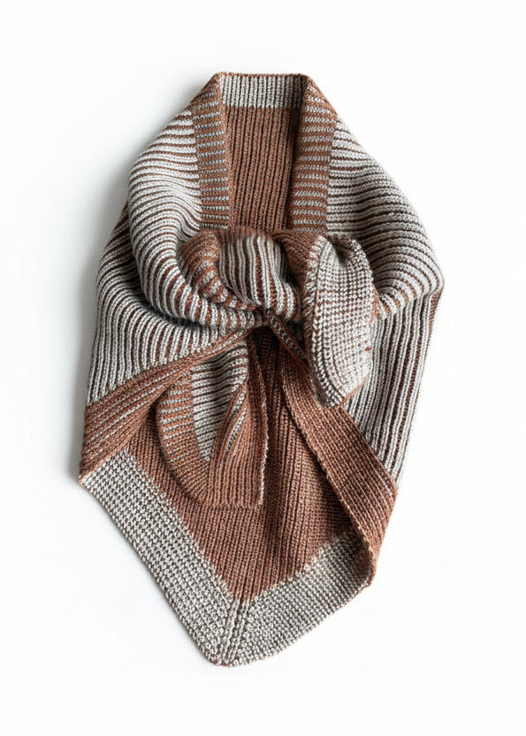 Cinnamon and sand colour folded triangle scarf on white background